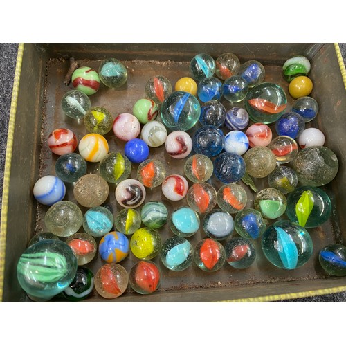15 - Collection of vintage marbles in an old advertising tin