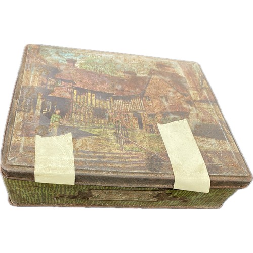 15 - Collection of vintage marbles in an old advertising tin