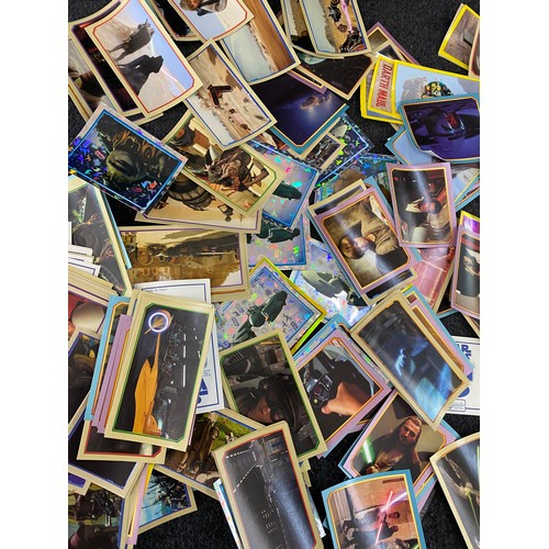 14 - Collection of unused star wars sticker and a selection of star wars tazos