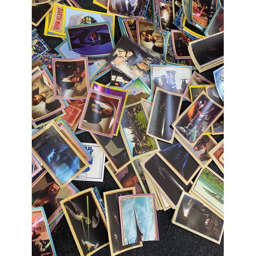 14 - Collection of unused star wars sticker and a selection of star wars tazos