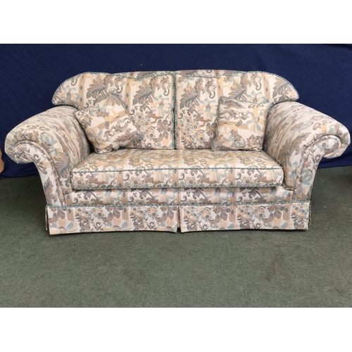685 - Pair of 2 seater sofas in cream & green floral fabric 200 cm l