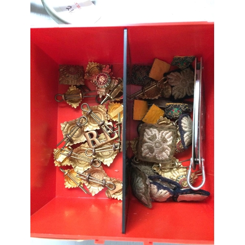 195 - Box of Regimental buttons, badges etc, pair of spurs, prismatic military compass in leather case, gr... 