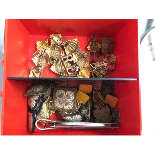 195 - Box of Regimental buttons, badges etc, pair of spurs, prismatic military compass in leather case, gr... 