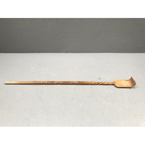 249 - Indonesian carved back scratcher