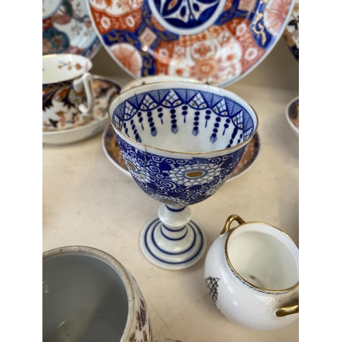 107 - Quantity of china to include Wedgwood, famille rose cups and tea bowls Crown Derby, Imari etc Condit... 