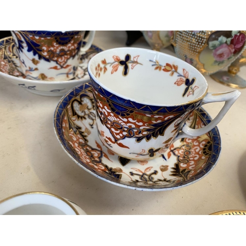 107 - Quantity of china to include Wedgwood, famille rose cups and tea bowls Crown Derby, Imari etc Condit... 