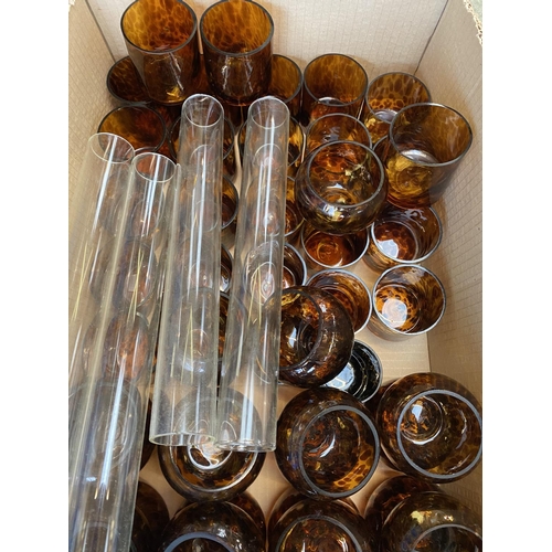 24 - Pair of large glass vases, qty of glass candle holders, glass plates, large qty of tea light holders... 