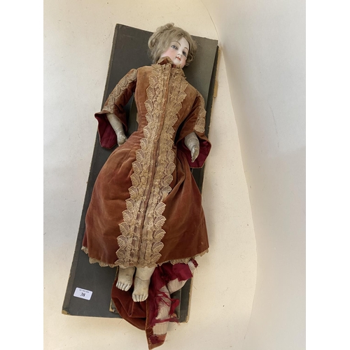 34 - Vintage doll -  porcelain head, leather legs, and period dress (condition - some general wear - see ... 