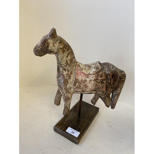 39 - Decorative model of a horse on a wooden plinth and a cow