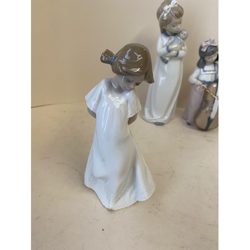 56 - Qty of Nao & Lladro figurines see images for details CONDITION: no obvious signs of restoration or d... 