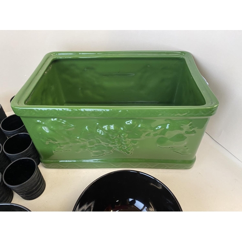 70 - A green planter, a quantity of tea light holders, bowls, and other general china etc