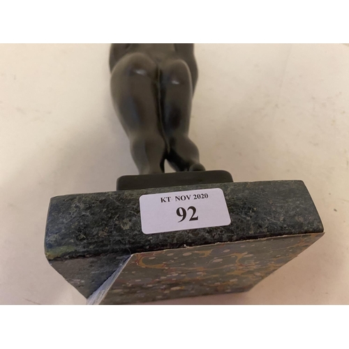 92 - Abstract Bronze figure of a nude lady on stand, 35cmH