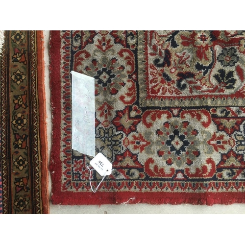 726 - Old traditional blue ground woollen rug with all over red and fawn stylised pattern   285 x 197