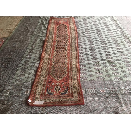 728 - Old Persian runner terracotta ground with central panel and multi border 300 x 77  wear to central p... 