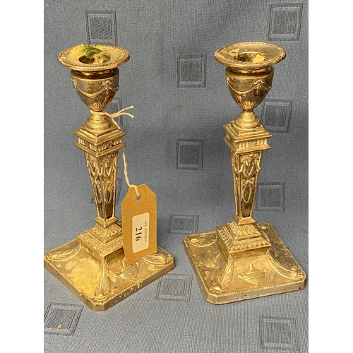 216 - Pair of hallmarked silver weighted Adam style square based candlesticks.  Sheffield 1930 20 cm H  us... 