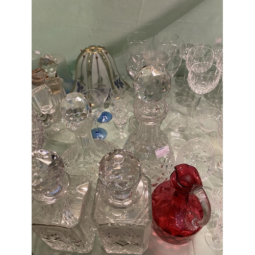 288 - Large quantity of glass ware including quantity of cut glass, plain glass, decanters, ruby jug, larg... 