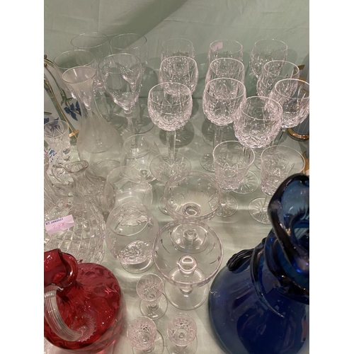 288 - Large quantity of glass ware including quantity of cut glass, plain glass, decanters, ruby jug, larg... 