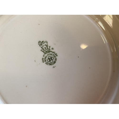 303 - A small C19th Willow pattern drainer 29cmL (good condition) and a Royal Doulton draining bowl on sta... 