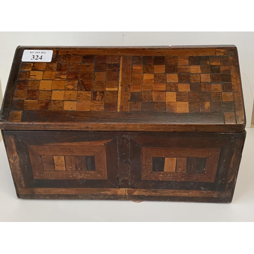 324 - C19th Country made lidded box of mixed geometric veneers, 26 cm Long