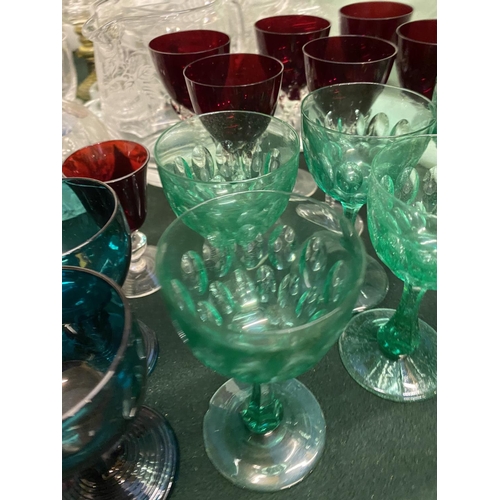 327 - Quantity of coloured stemmed glasses, approx. 37 pieces, including cranberry and green (approx. 6 wi... 