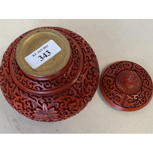 343 - Chinese carved cinnabar lacquered pot and lid, 12cm D, (condition - some wear around lid edge )