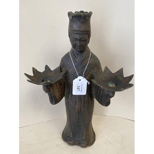 347 - Chinese bronze robed figure holding a pair of 8 pointed leaf vessels, 34cm H, General wear