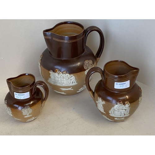 367 - Set of 3 graduated Royal Doulton harvest jugs the largest 20 cm H, and  a studio pottery vase and  g... 