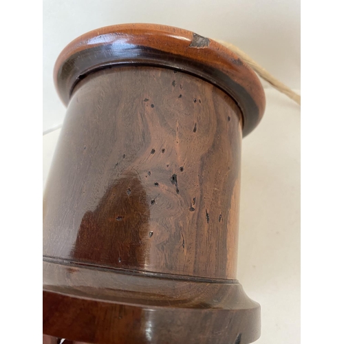 370 - Polished lignum Vitae cylindrical string box 13cm D, (condition, chip to rim of lid and a crack to l... 