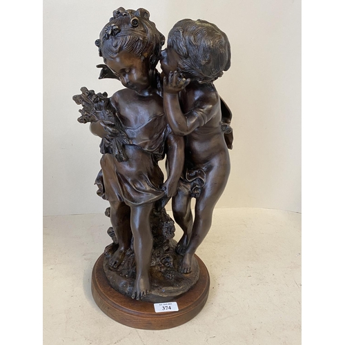 374 - Bronze figure group of 2 children on circular wooden plinth, 43cm H (condition good, a few tiny chip... 