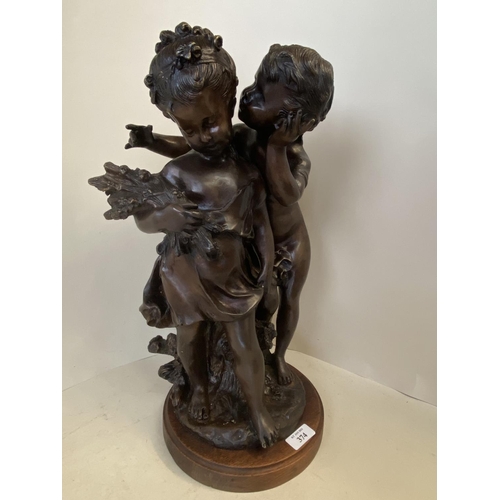 374 - Bronze figure group of 2 children on circular wooden plinth, 43cm H (condition good, a few tiny chip... 