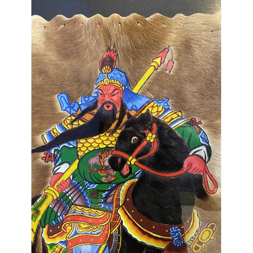 38 - Large framed and glazed painting of a Chinese warrior on a horse, mixed media including mounted on a... 