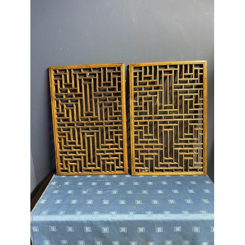 407 - Pair of decorative  mahogany oblong geometric pattern wall panels  (condition, minor wear, one frame... 