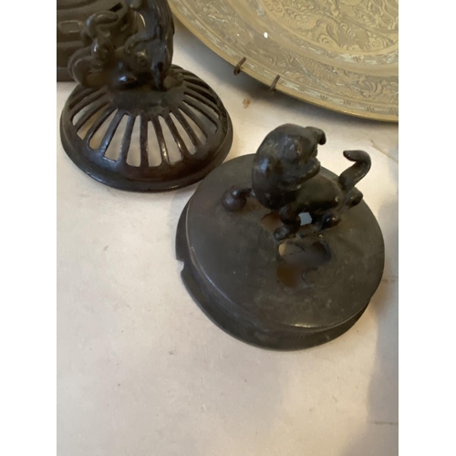 422 - Group of Oriental bronze censer covers, a bronze figure and a bronze dragon plate