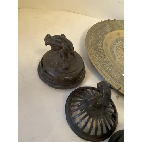 422 - Group of Oriental bronze censer covers, a bronze figure and a bronze dragon plate