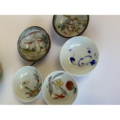 426 - Group of Chinese and Japanese saucers, cups and a bowl.
ALL OF THESE LOTS HAVE cracks/chips etc - se... 