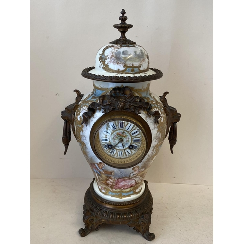 428 - Good quality C19th French porcelain mantle clock with ormolu decoration and mask handles with detach... 