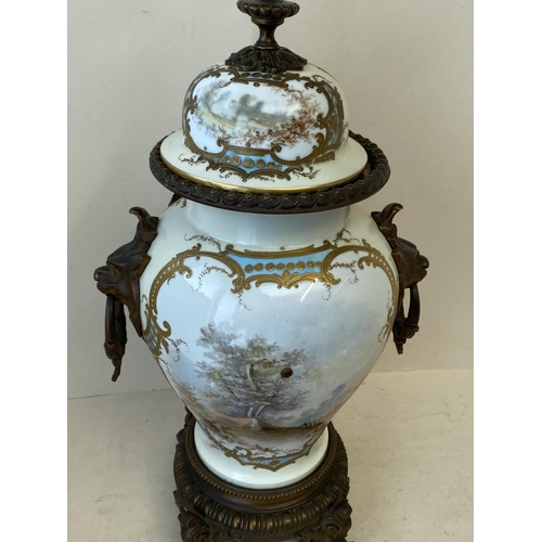 428 - Good quality C19th French porcelain mantle clock with ormolu decoration and mask handles with detach... 