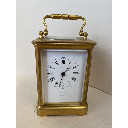 435 - Good brass carriage clock, white enamel dial Littlejohn Stirling Dunfermline.  The mechanism strikin... 