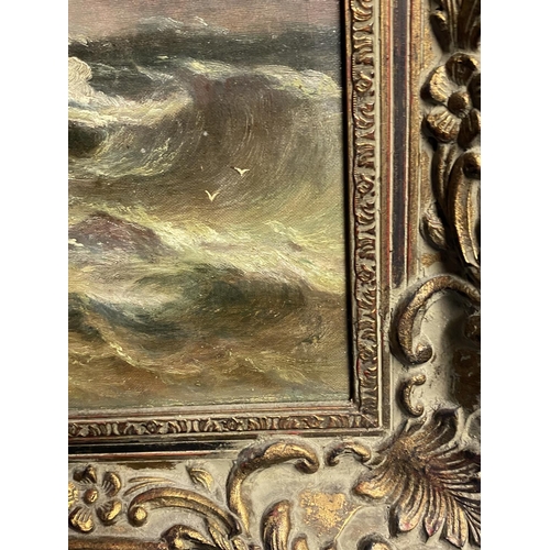 9 - C19th oil on canvas, figures on rocks within a stormy sea, 50 x 60cm