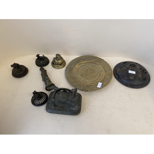 422 - Group of Oriental bronze censer covers, a bronze figure and a bronze dragon plate