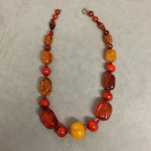 102 - Strand of amber and honey/mixed amber beads, 40 grams 43cm