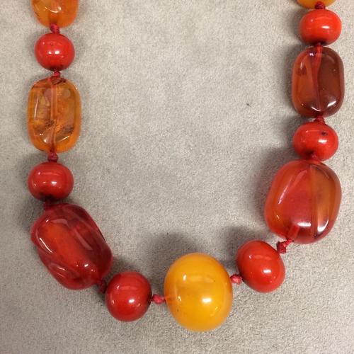 102 - Strand of amber and honey/mixed amber beads, 40 grams 43cm