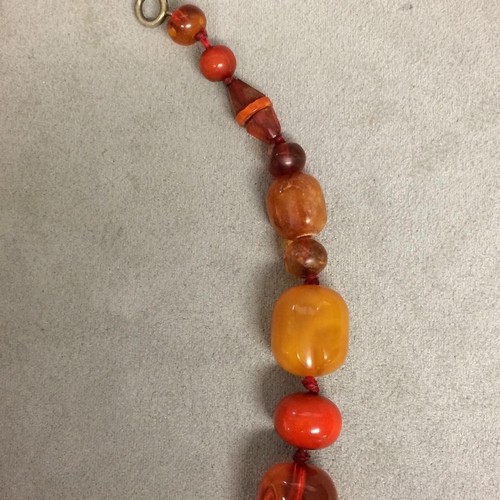 102 - Strand of amber and honey/mixed amber beads, 40 grams 43cm