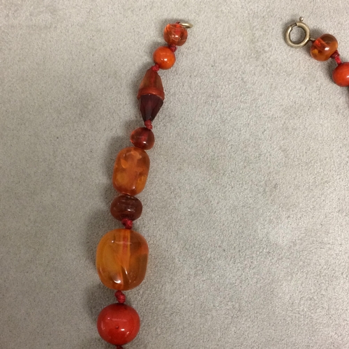 102 - Strand of amber and honey/mixed amber beads, 40 grams 43cm