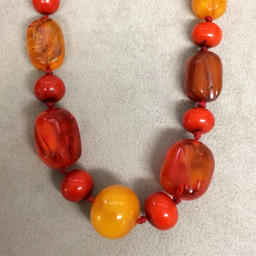 102 - Strand of amber and honey/mixed amber beads, 40 grams 43cm