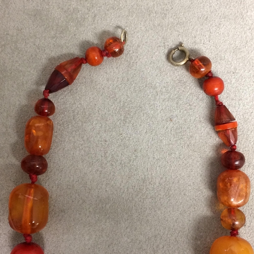 102 - Strand of amber and honey/mixed amber beads, 40 grams 43cm