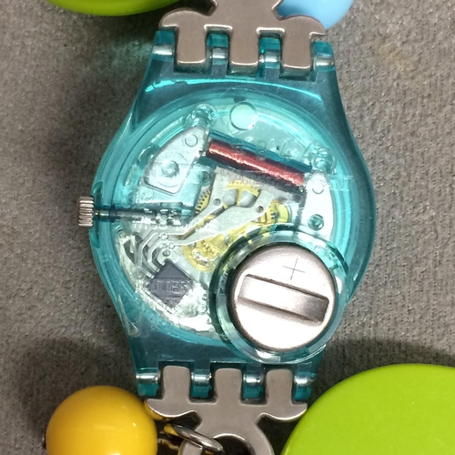 411 - SWATCH 1990s  with floral white metal band and a white metal finger watch