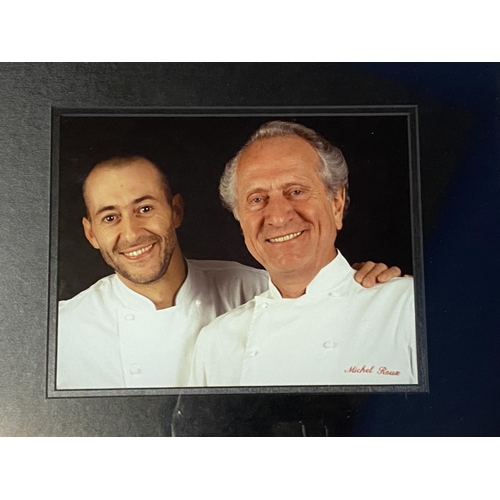 429 - The famous Roux Family Chefs memorabilia: Framed and glazed photograph of Albert Roux with his dogs ... 