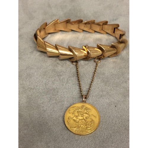 10 - Unmarked yellow metal bracelet with 1911 George V gold sovereign, 29.7g