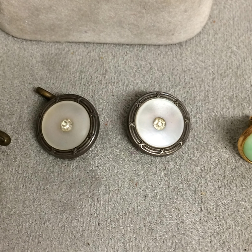 105 - Collection of unmarked yellow and white metal dress studs